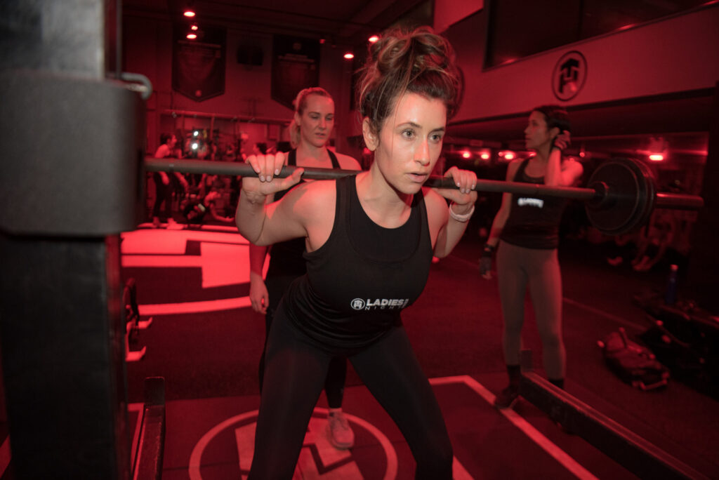 female athlete squatting